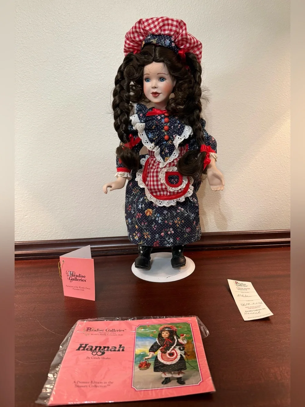 Hannah Porcelain Doll in Navy Floral Dress with Red Gingham Accents